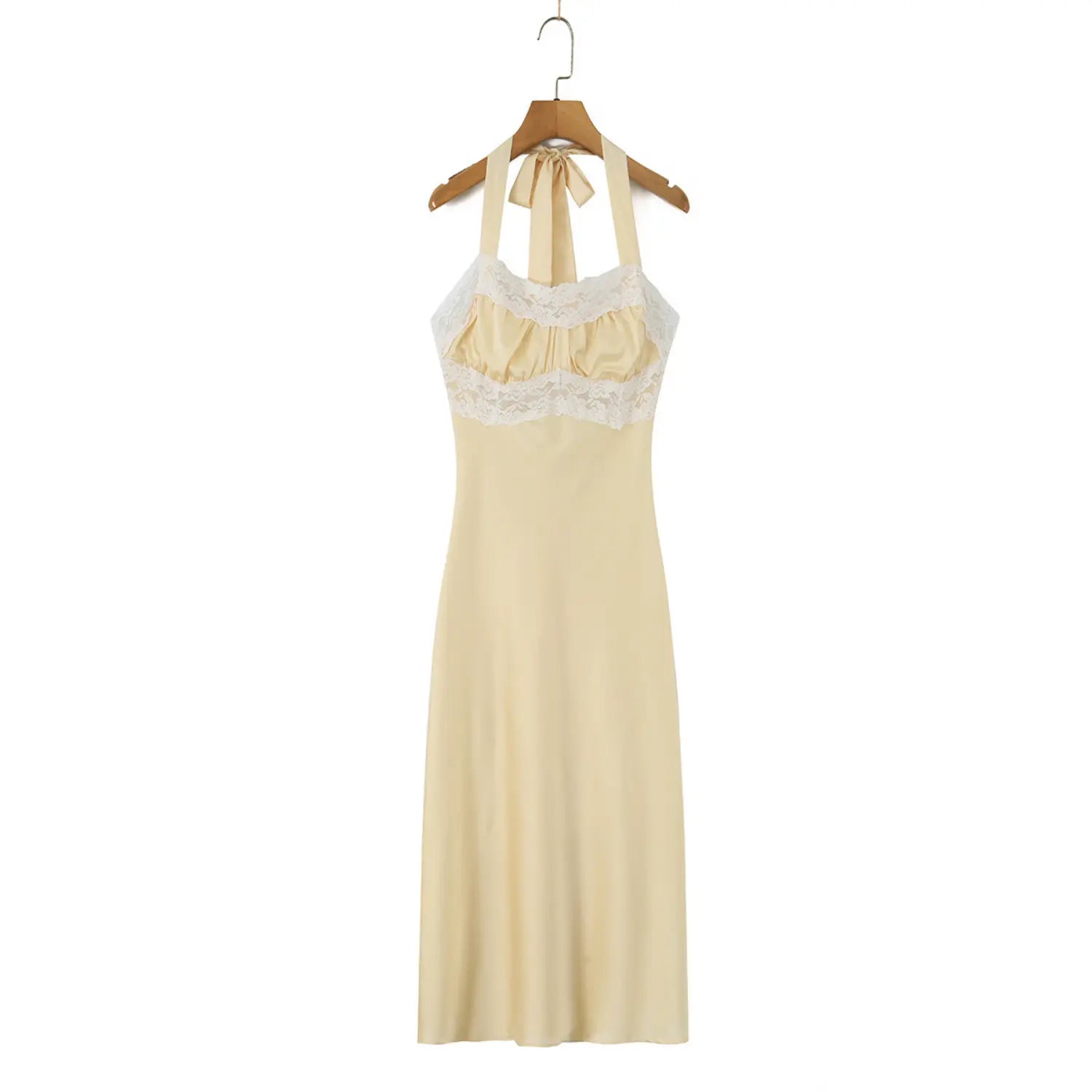Pale yellow halter lace satin maxi dress hanging on wooden hanger, front view