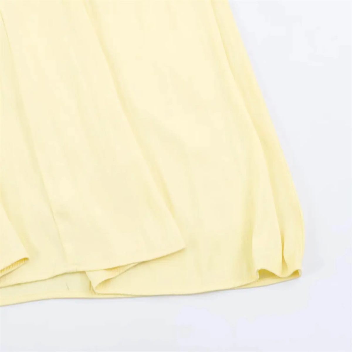 Close‑up of loose flowy skirt hem texture