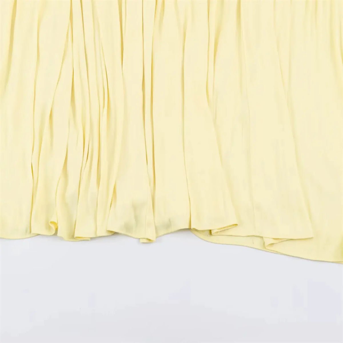 Partial view of flowy tiered maxi skirt fabric