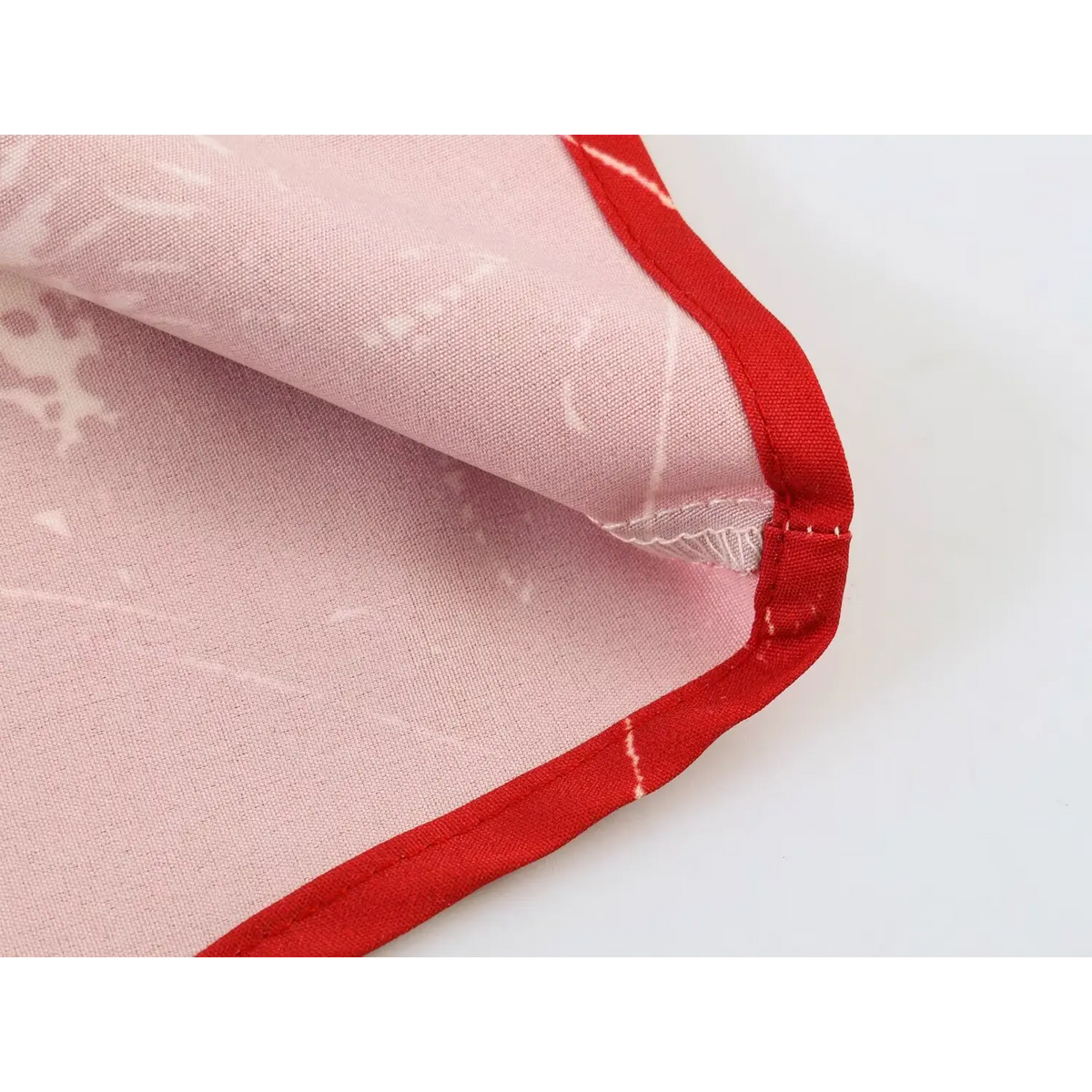 Close-up of red bound hem edge
