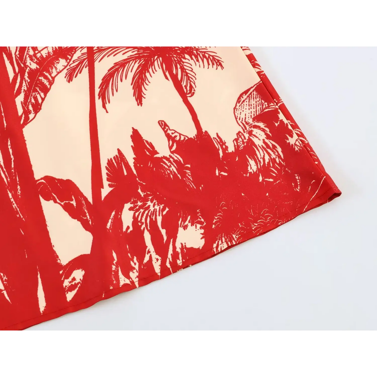 Close-up of palm print skirt hem