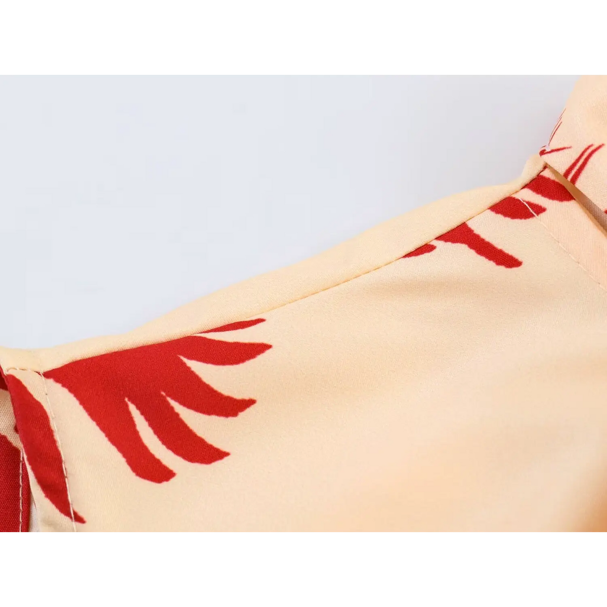 Close-up of shoulder seam and print