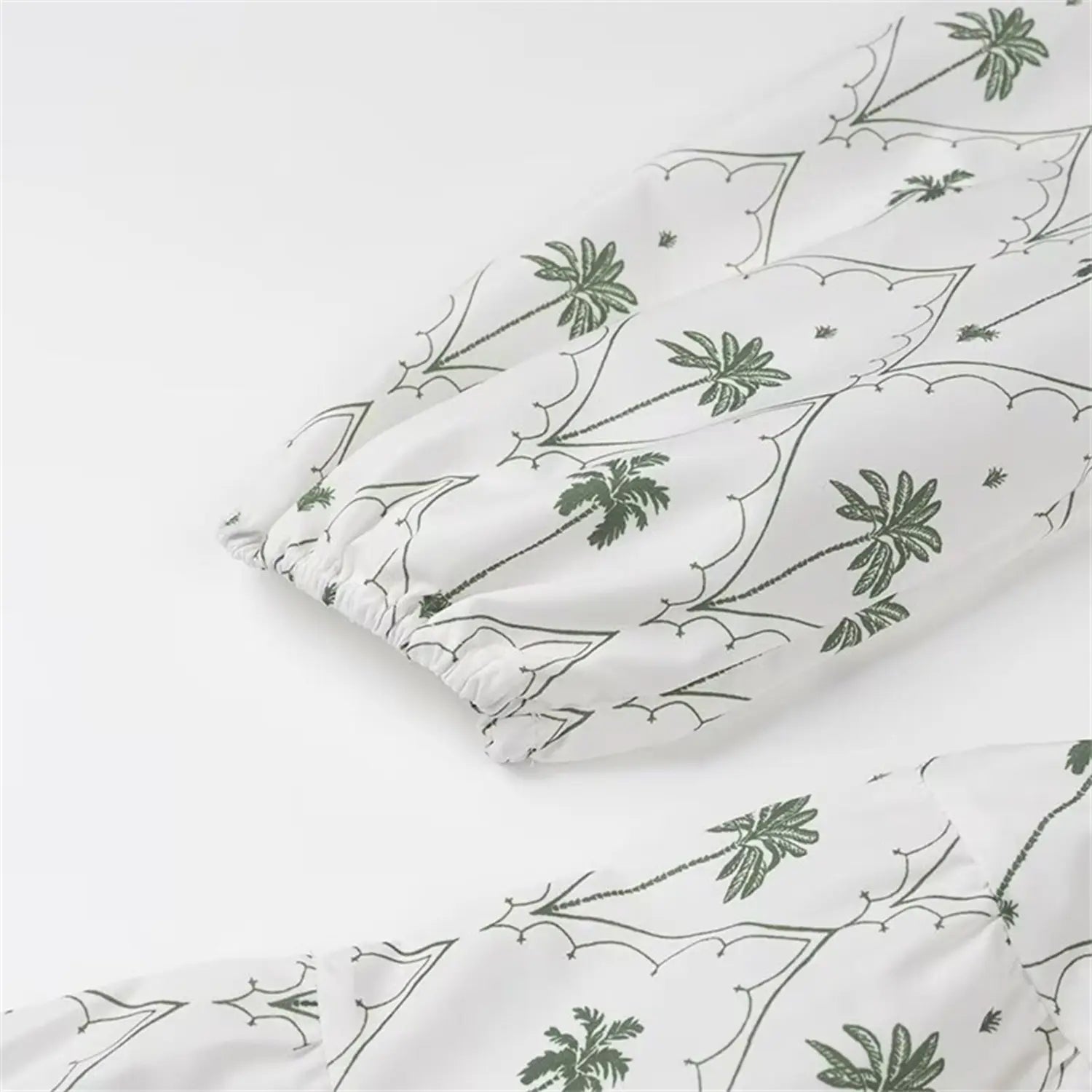 Extra close-up of gathered elastic sleeve hem