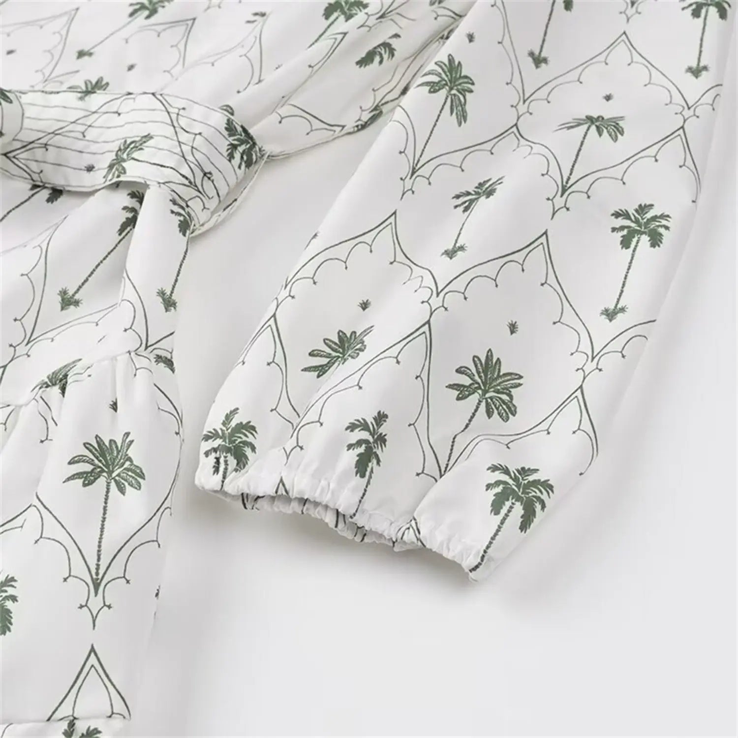 Close-up of elastic puff sleeve cuff with palm print