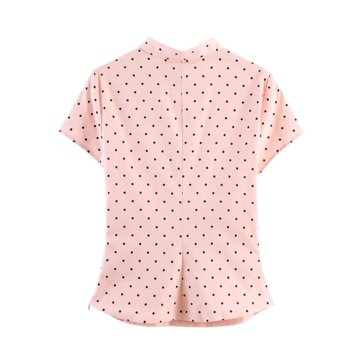  Full back view of the peach polka dot top, showing the center back seam and tailored fit