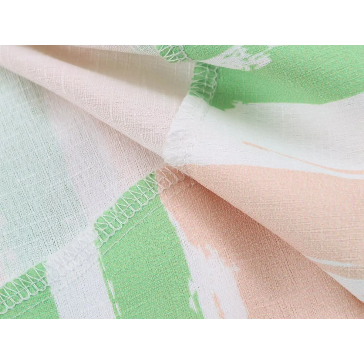 Texture close‑up of lightweight woven stripe fabric of maxi dress