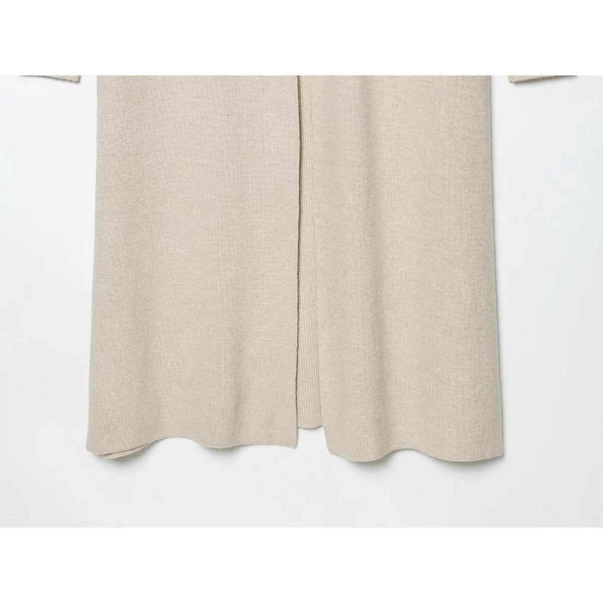 Close-up of front hem slit opening