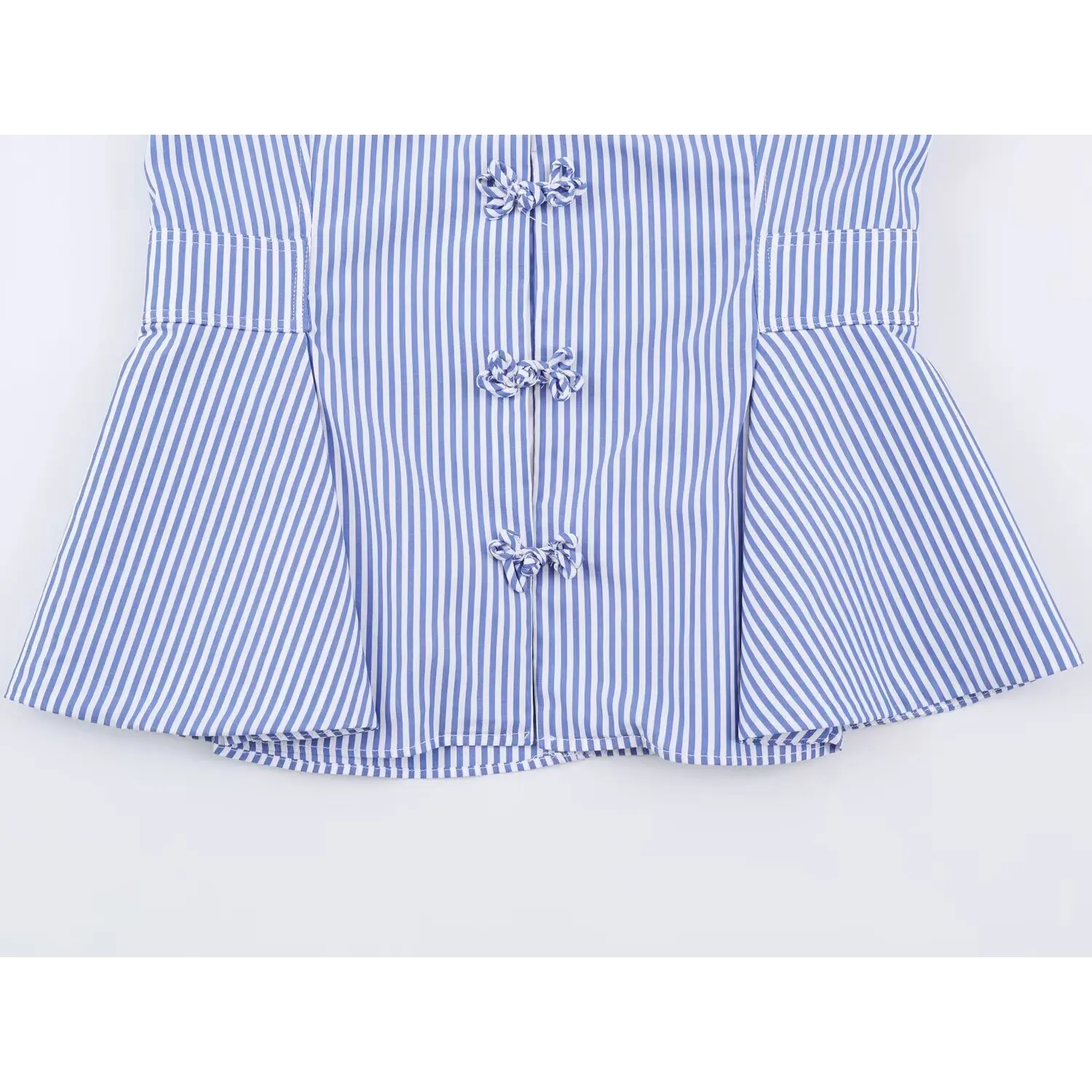 Flat shot waist seaming and flared peplum hem, fitted waist silhouette