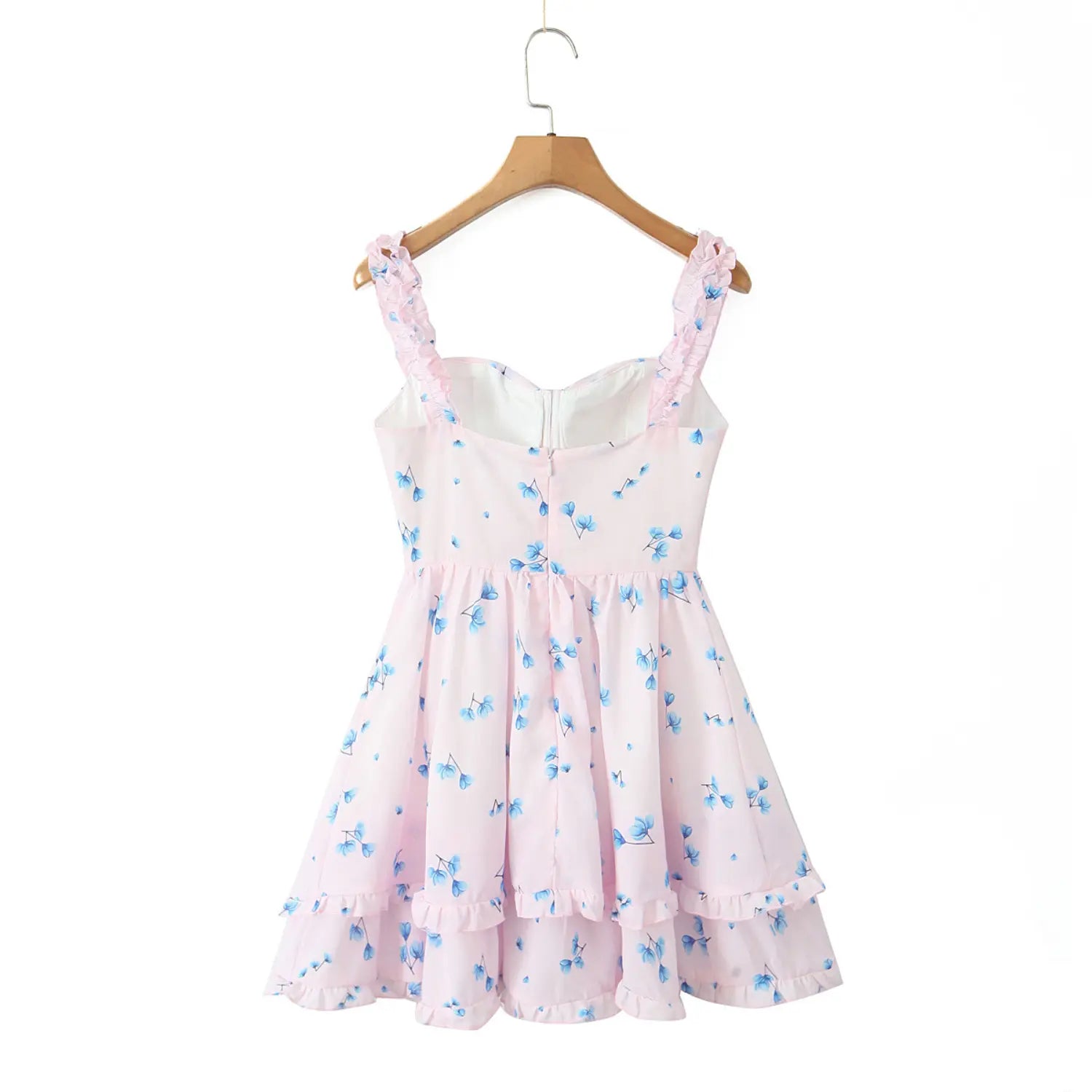 Hanging back full view pink mini dress with blue floral print, ruffle elastic shoulder straps, invisible back zipper, double tier ruffle skirt