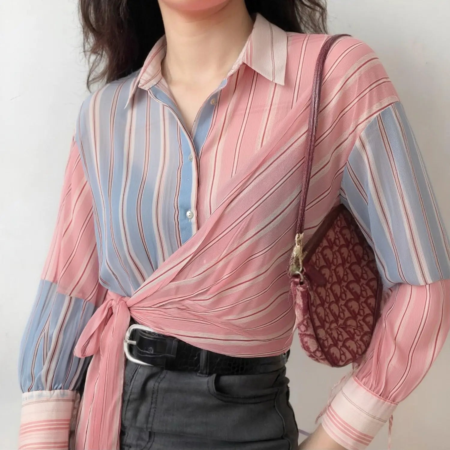 Front lifestyle shot on model, wrap tie cropped striped blouse, matched with dark denim, casual sweet summer layered outfit