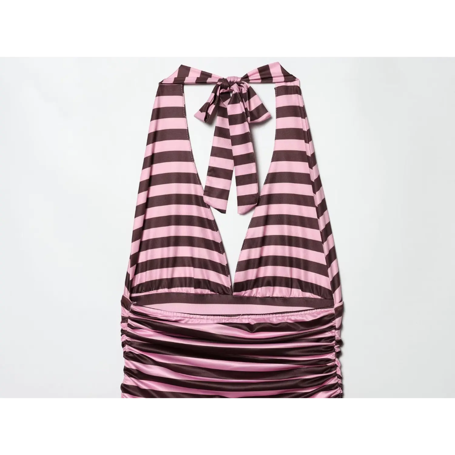 Mid-body flat shot, horizontal striped shiny fabric, full side ruching from underbust down to hip, elasticated gathering for adjustable fit, wide solid waist band division