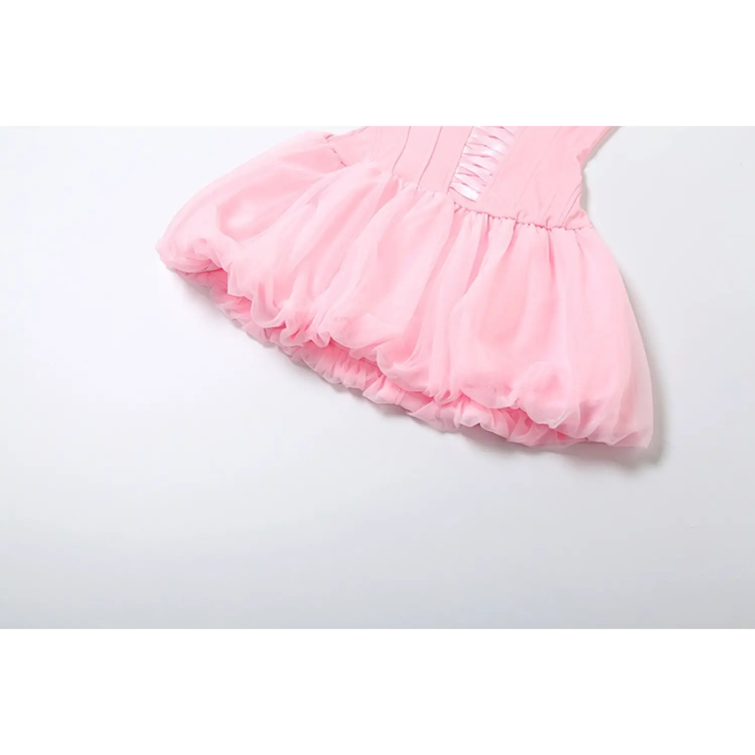 Flat lay partial shot voluminous pink bubble tulle mini skirt hem texture