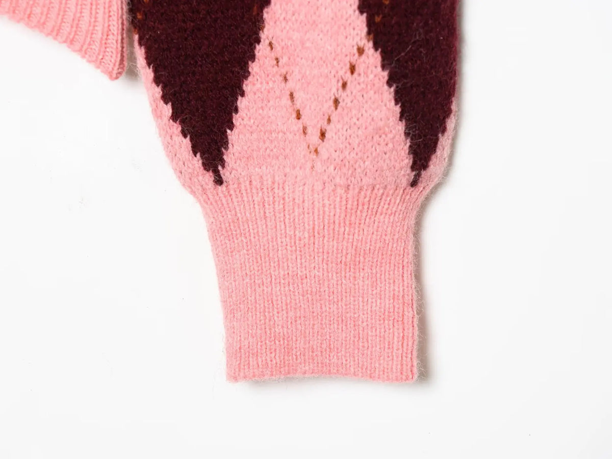 Close-up of ribbed cuff and argyle pattern