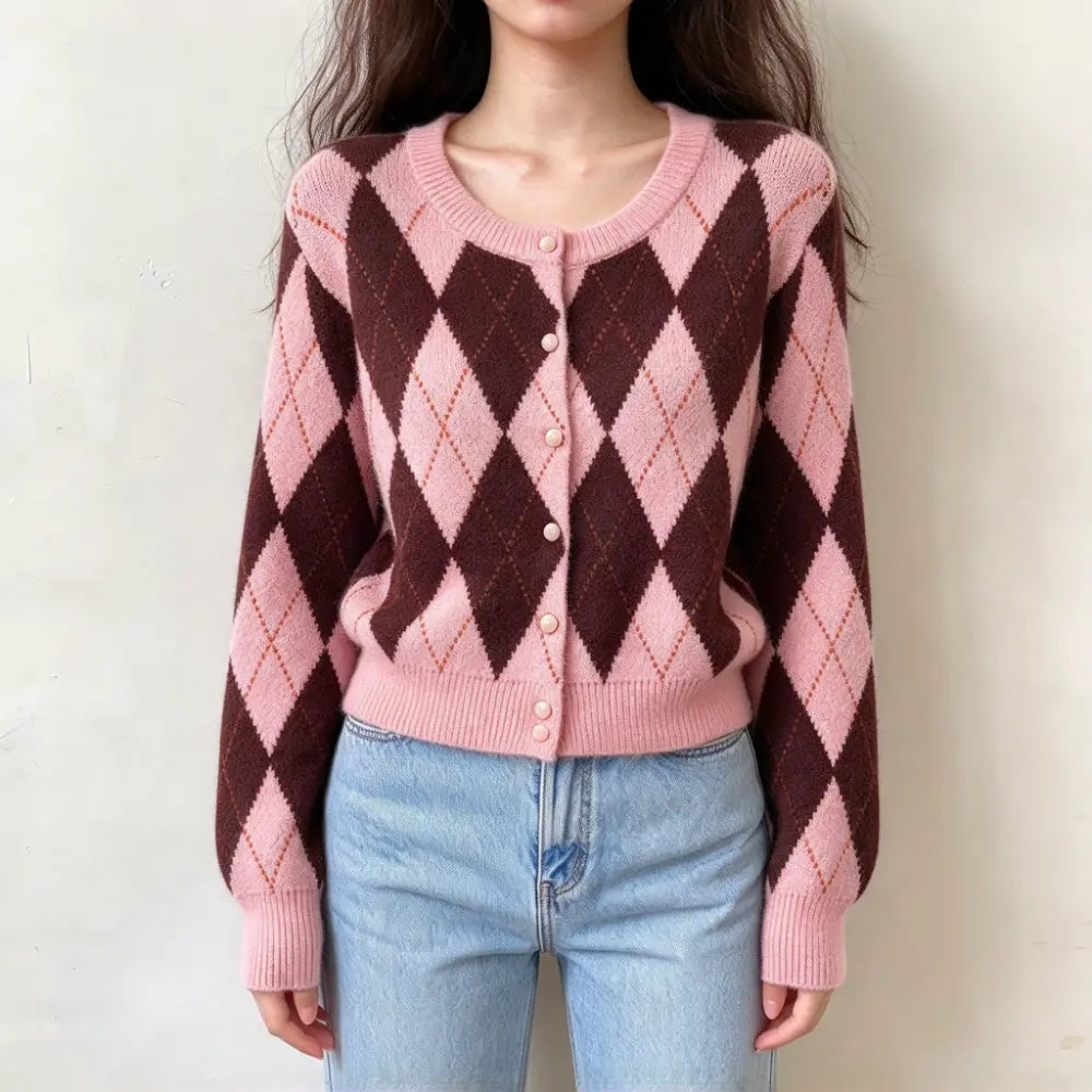 Model wearing pink burgundy argyle round neck button front cardigan with jeans, front view