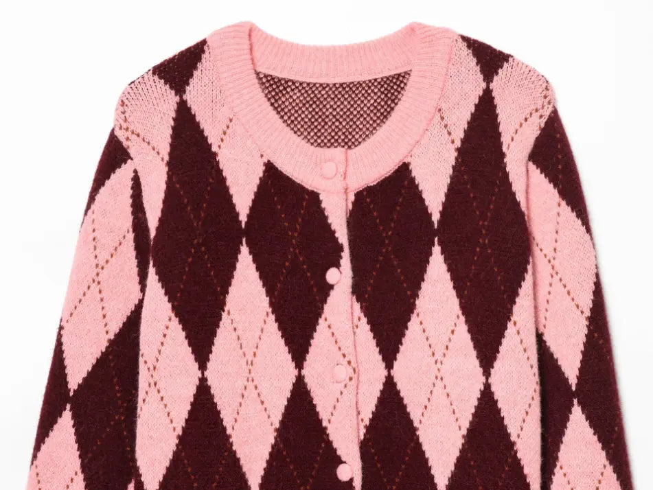 Close-up of round neckline and button placket