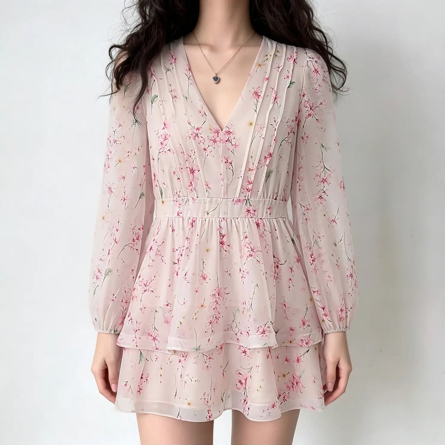 Front lifestyle shot on model, V-neck layered cherry blossom chiffon mini dress, long balloon sleeves, sweet romantic summer outfit