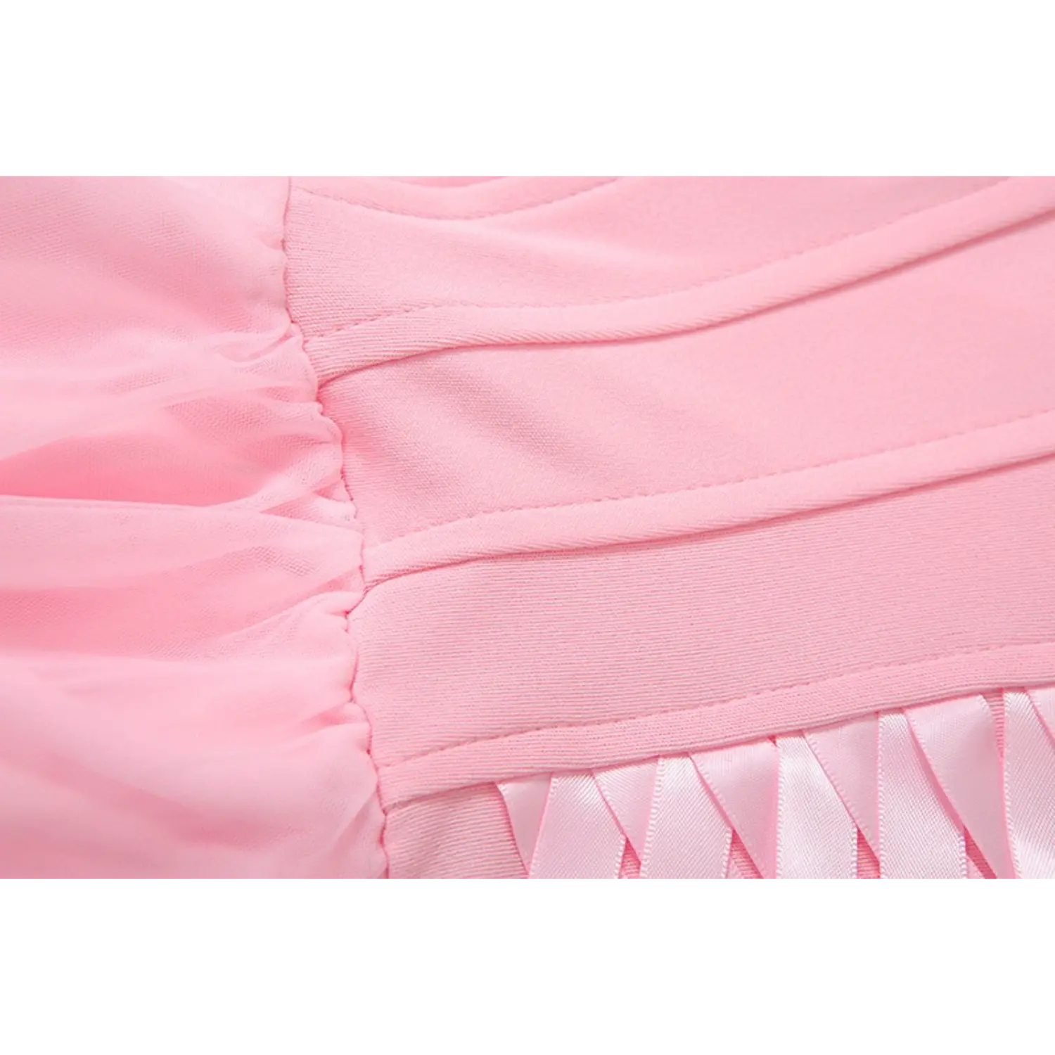 Close‑up stitching seam detail between corset bodice and tulle bubble skirt