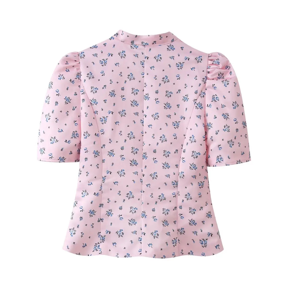 Full back view of the pink ditsy floral blouse, showing the princess seams and puff sleeves