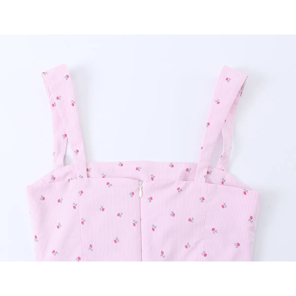 Close-up of the center back zipper, showing the white pull tab and the full print pattern.