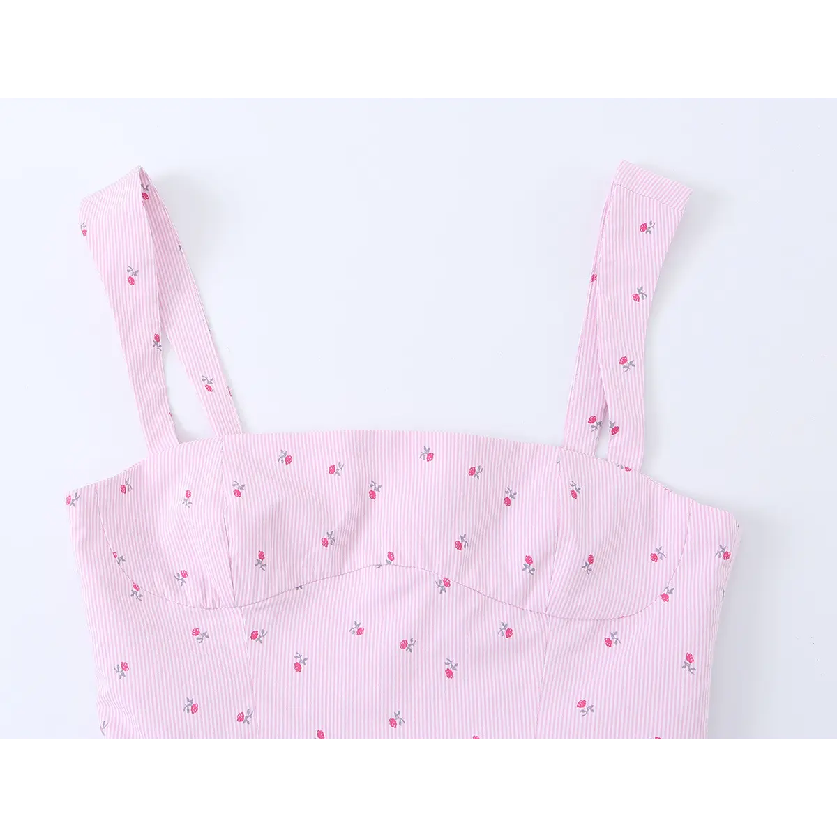 Close-up of the wide straps and the top edge of the bodice, showing the neat stitching and print alignment.