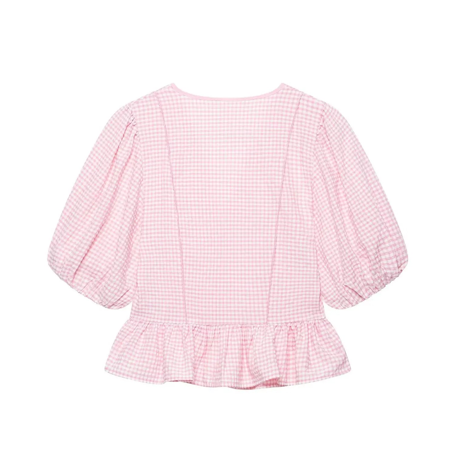 Complete back flat view, solid pink gingham pattern, vertical princess seams, puff short sleeves, matching ruffled peplum hem