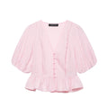 Full front flat lay main shot of light pink gingham blouse, v-neckline, front fabric button placket, puff short sleeves, ruffled peplum hem, crinkle lightweight woven fabric