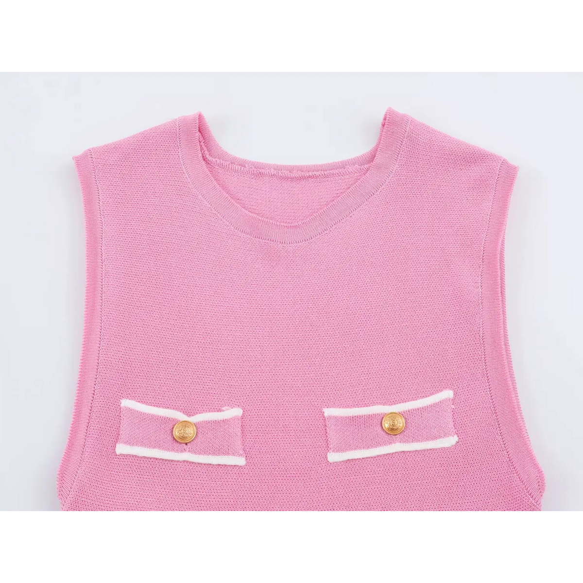 Close-up of chest pockets and gold buttons