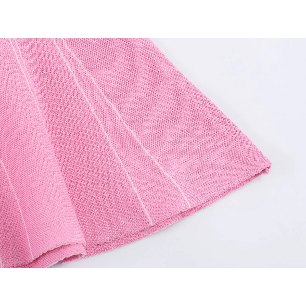 Close-up of skirt hem drape and stripe detail