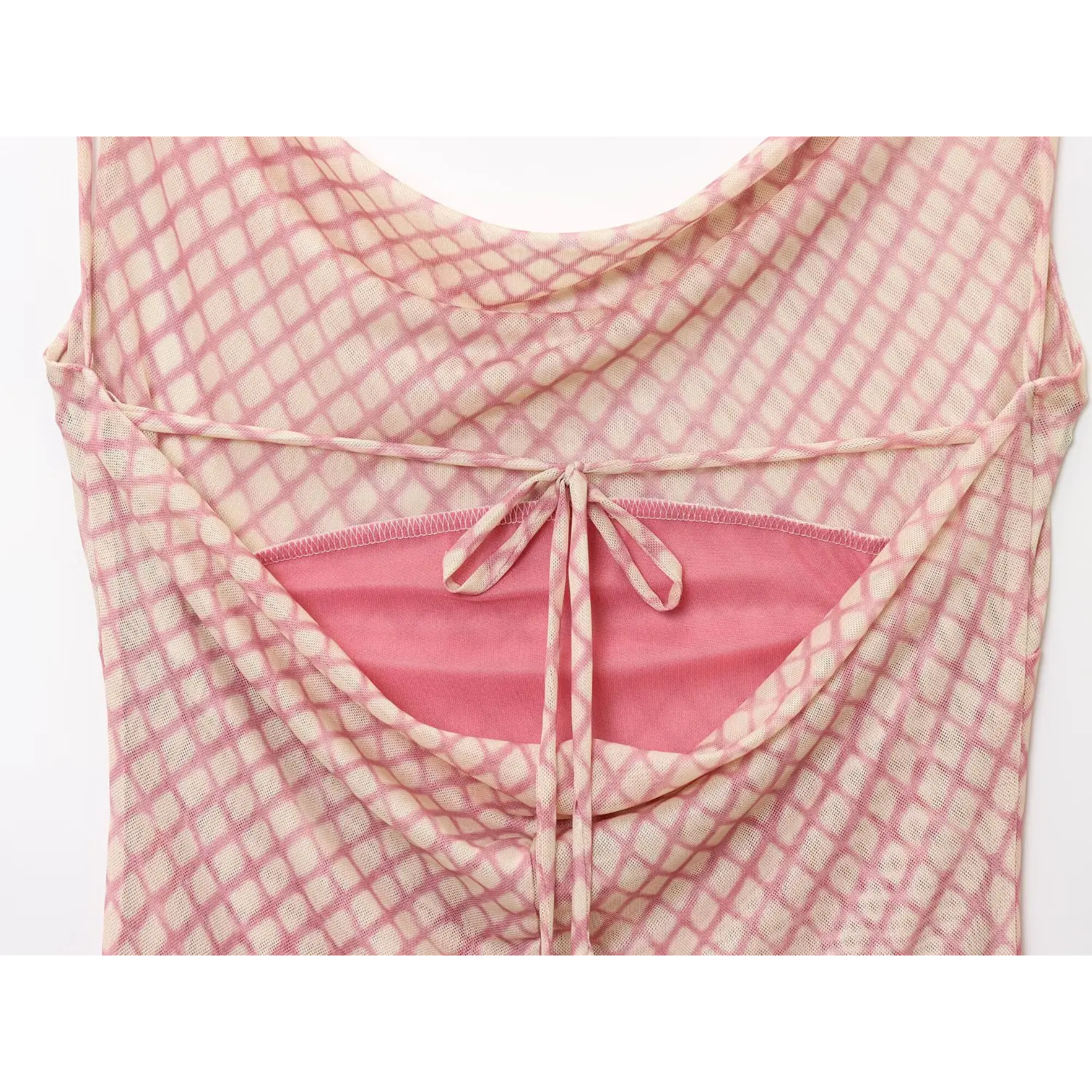 Close-up back view of pink grid mesh spaghetti strap midi dress with tie detail and open back design