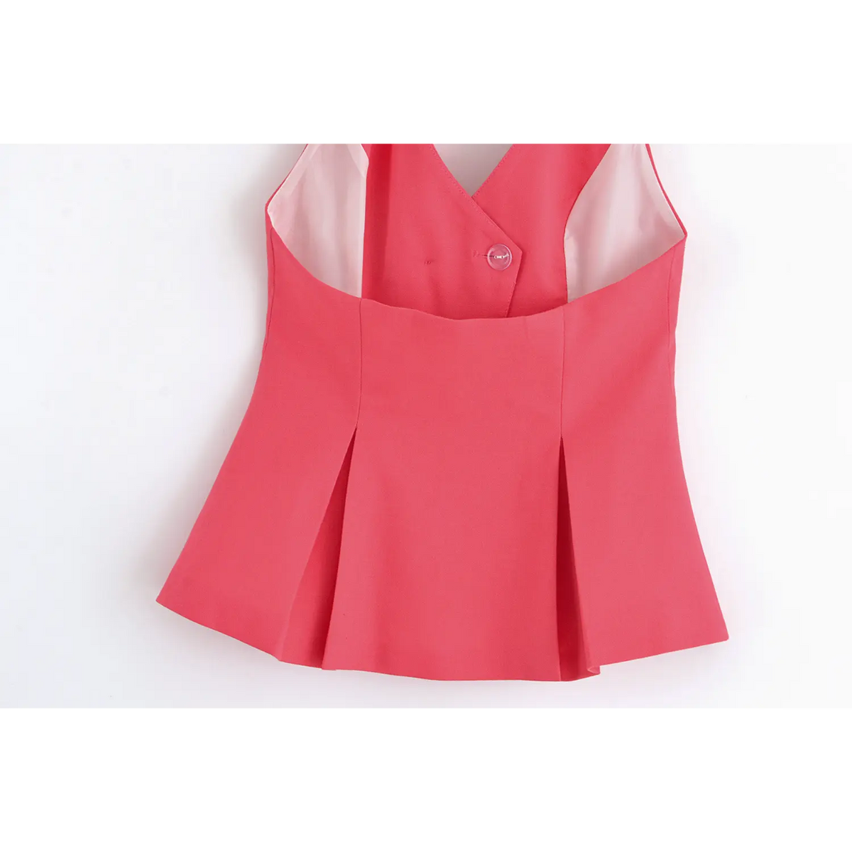 Close-up of back peplum hem