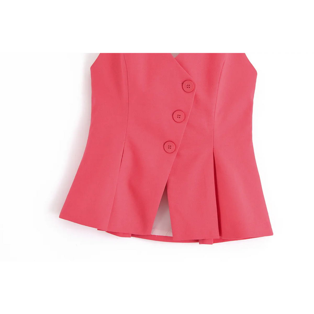 Close-up of three asymmetric buttons and peplum hem