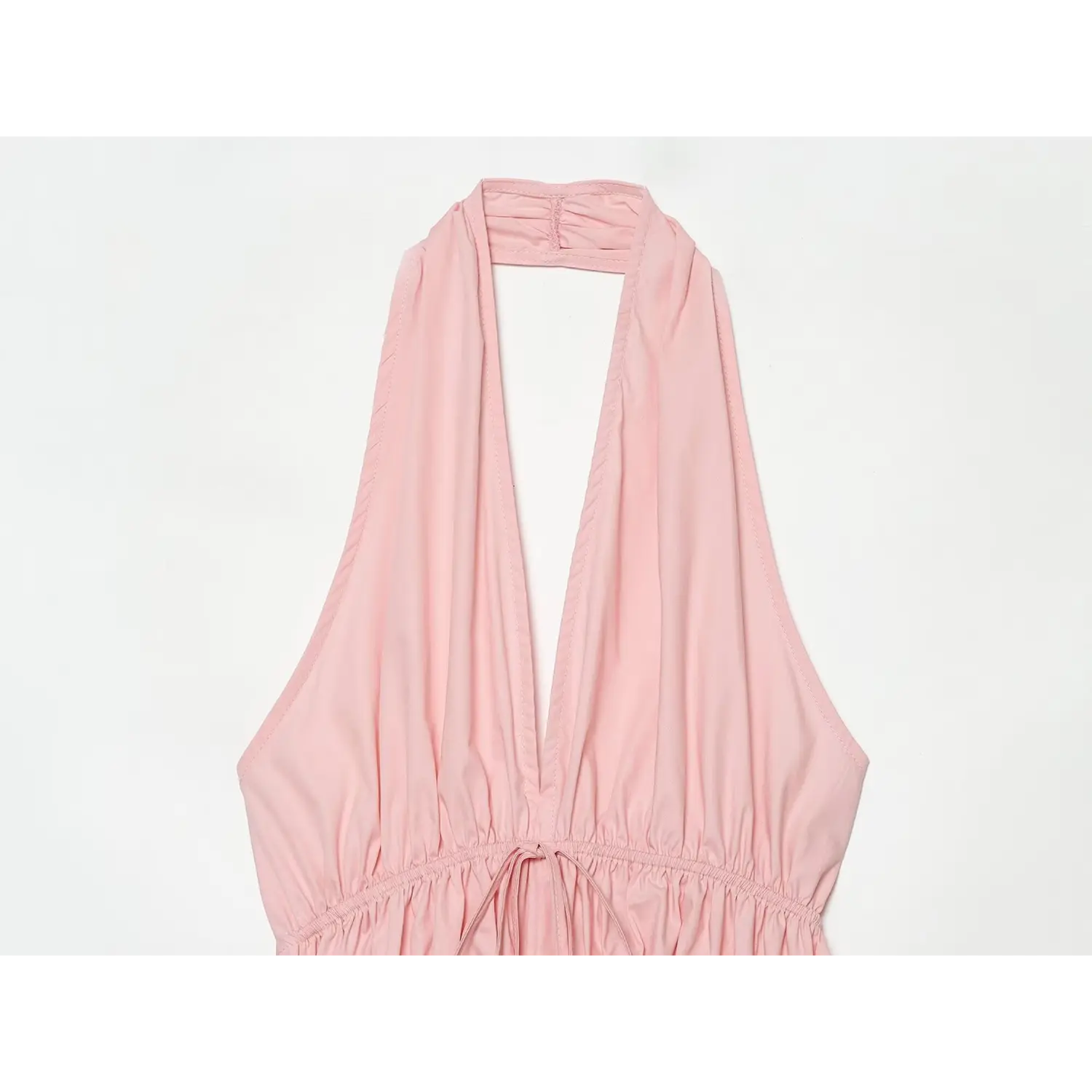 Close-up detail of halter neckline, deep V front, fabric gathering and stitching