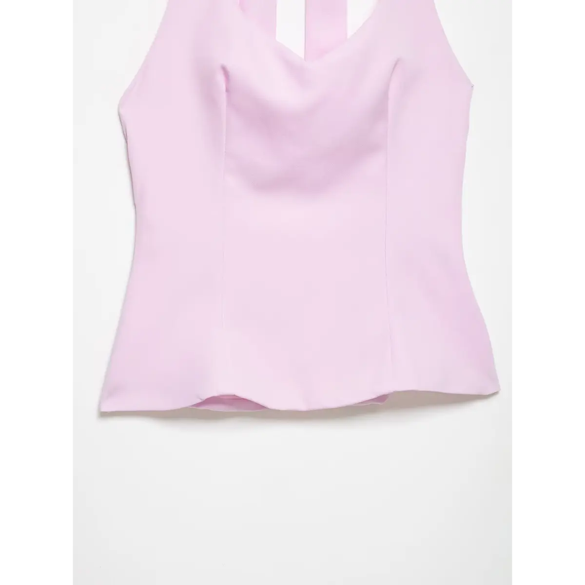 Full view of the top's front, showing the V-neck, princess seams, and fitted silhouette.