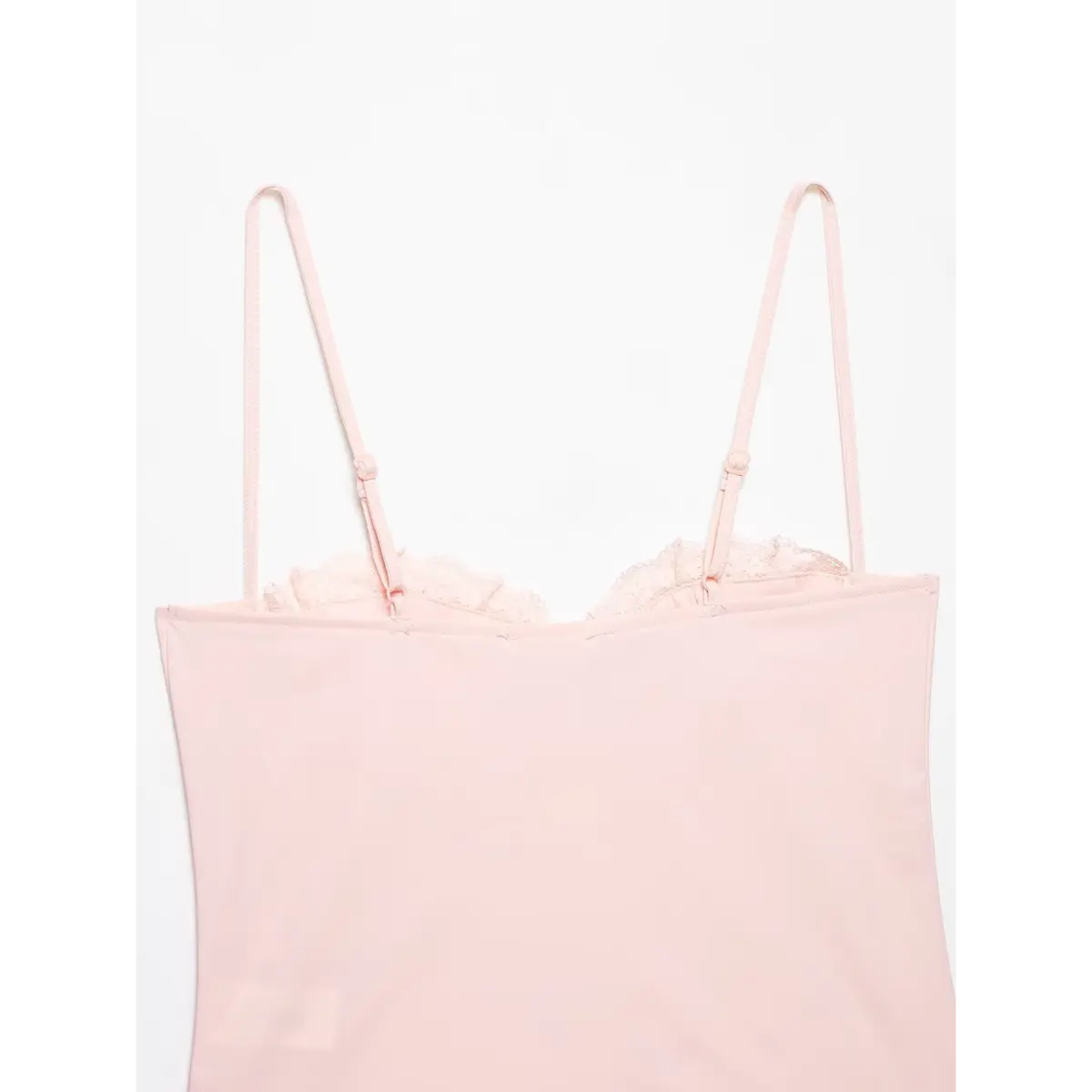 Full back shot of the pink camisole, displaying the adjustable straps and smooth back panel.