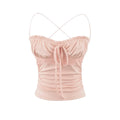 Studio shot of pink lace-trim cami top, featuring drawstring bust, lace waist and side ruching.