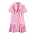 Full front flat view of a pink linen blazer dress with a single gold button, short sleeves, and pleated hem.
