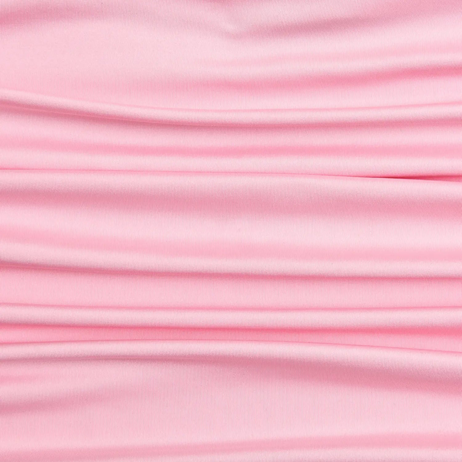 Flat lay texture shot of soft stretch pink mermaid skirt fabric