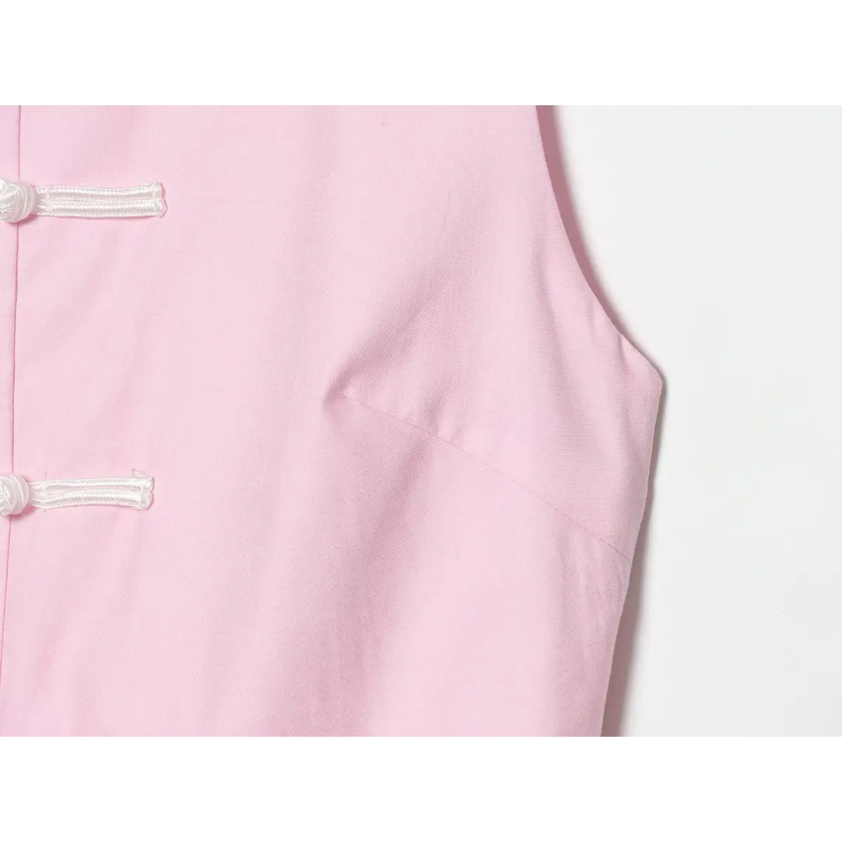 Close-up of the top's armhole and princess seam construction.