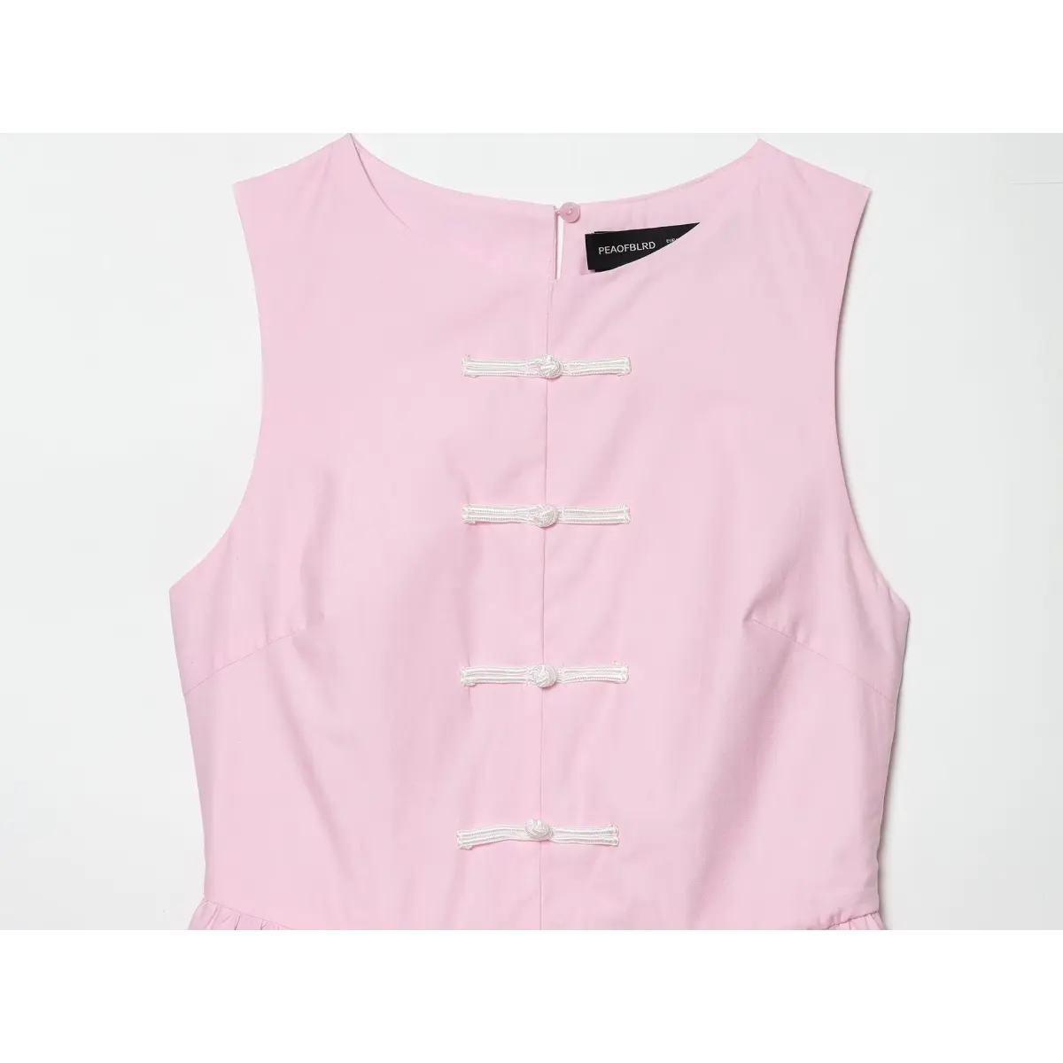 Top view of the front, showing all four frog closures and the neckline button.