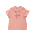 Front flat lay view of pink white polka dot chiffon blouse, ruffled collar with front tie knot, flutter short sleeves