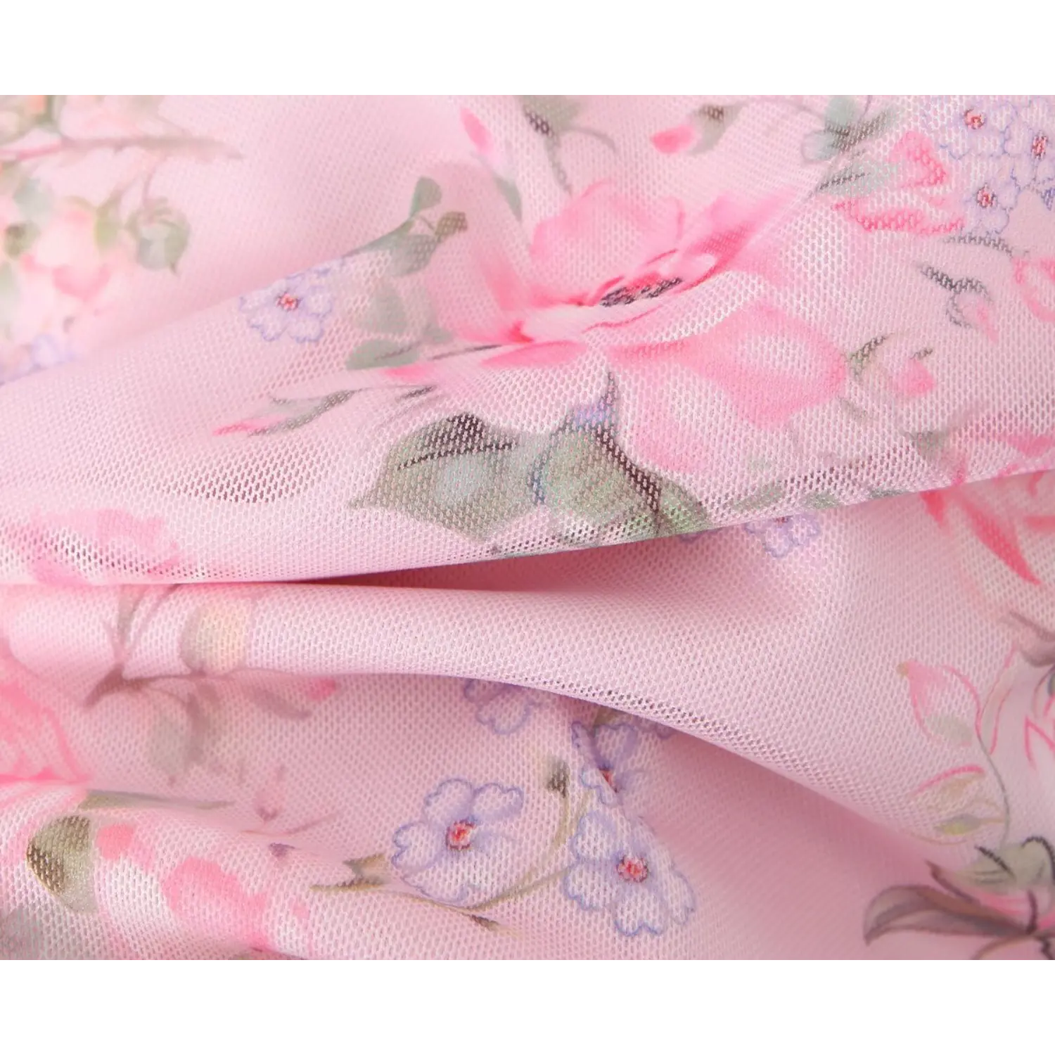 Twisted fabric close‑up, soft stretch pink mesh material with vintage rose floral print texture