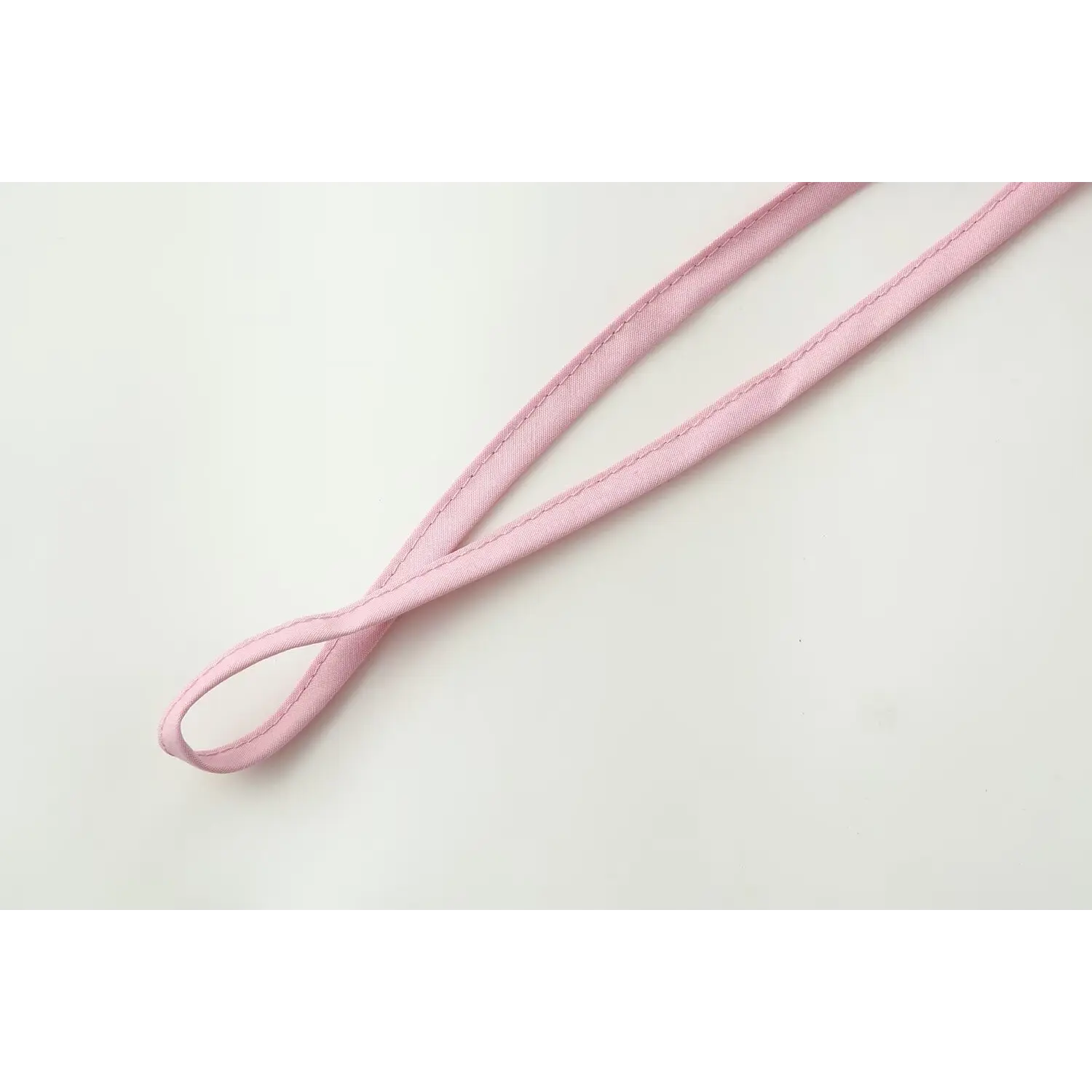 Detachable fabric drawstring close-up