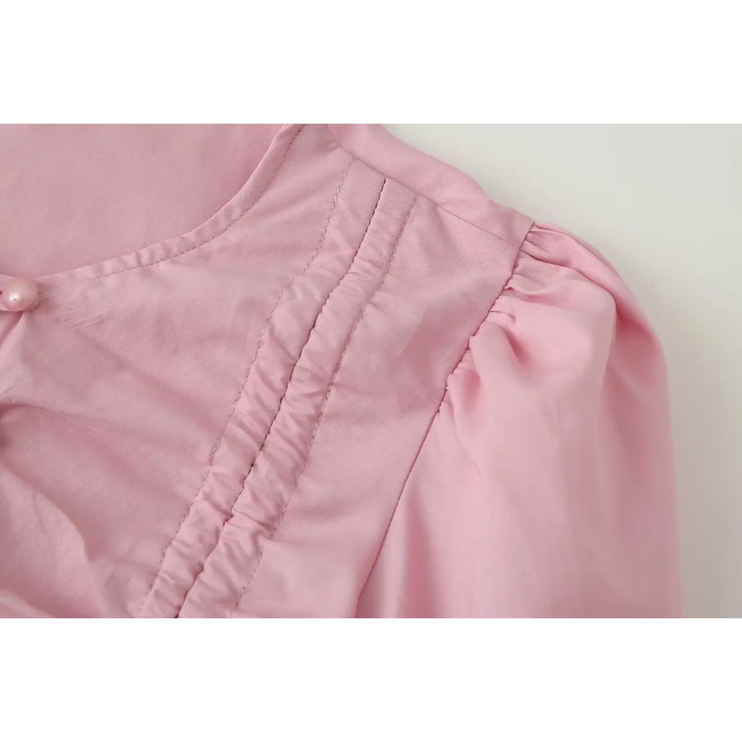 Front vertical ruched stitching fabric close-up