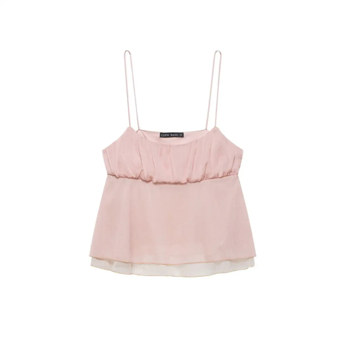 Flat lay view of a light pink ruffled cami top, showing the full silhouette, spaghetti straps, and double-layered hem.