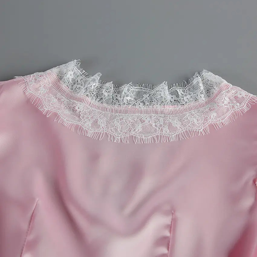 Close-up of back neckline white lace trim