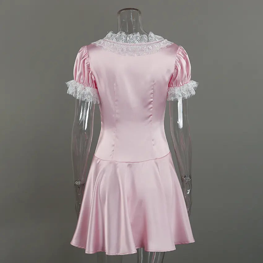 Pink satin lace trim puff sleeve mini dress on mannequin, back view