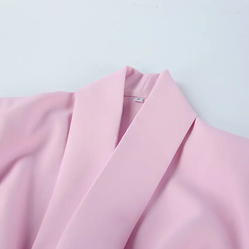 Close-up of shawl collar and V neckline