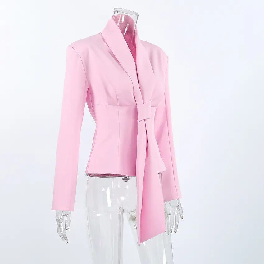 Pink shawl collar self tie fitted long sleeve blouse on mannequin, three quarter view