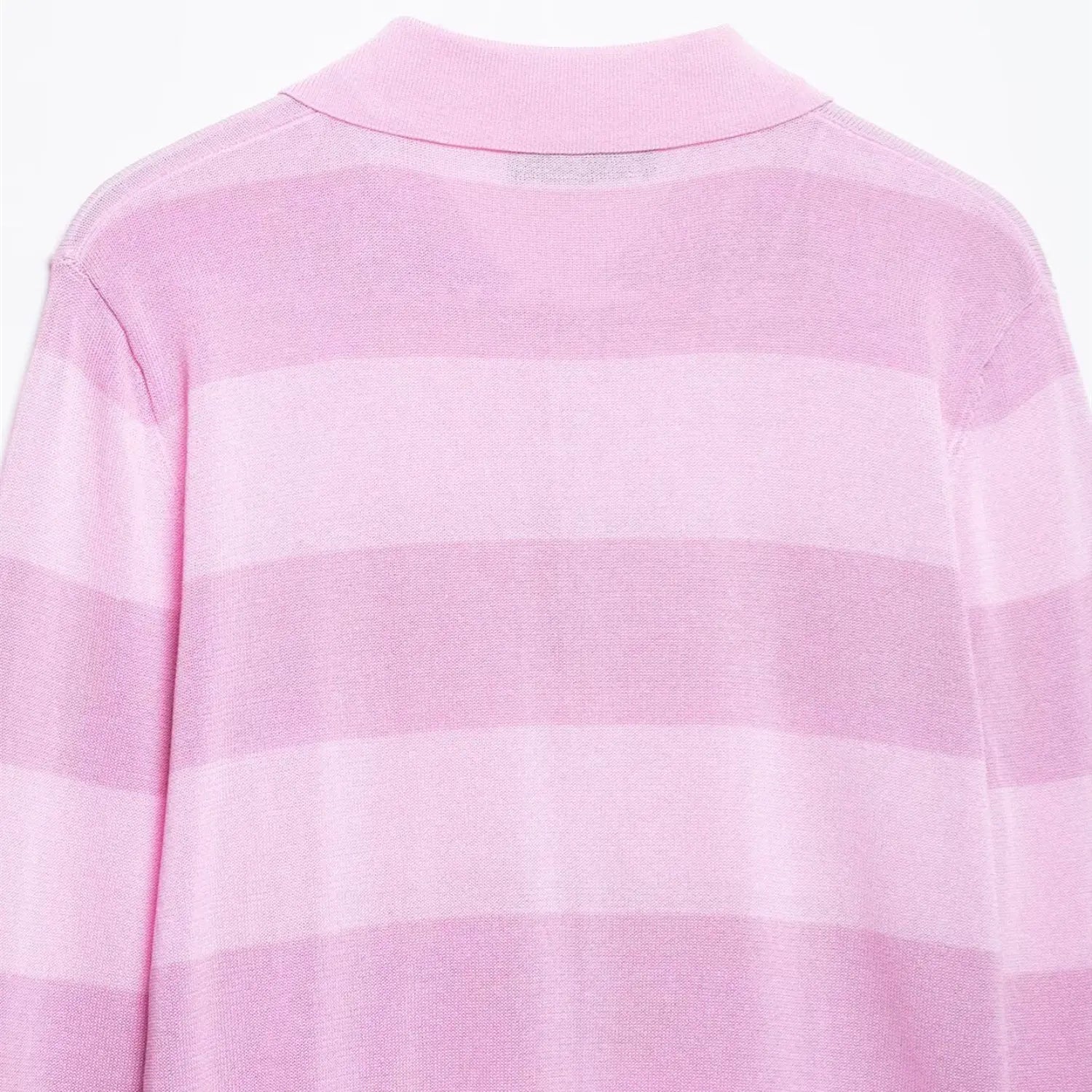 Close-up of the ribbed polo collar on the pink striped knit cardigan