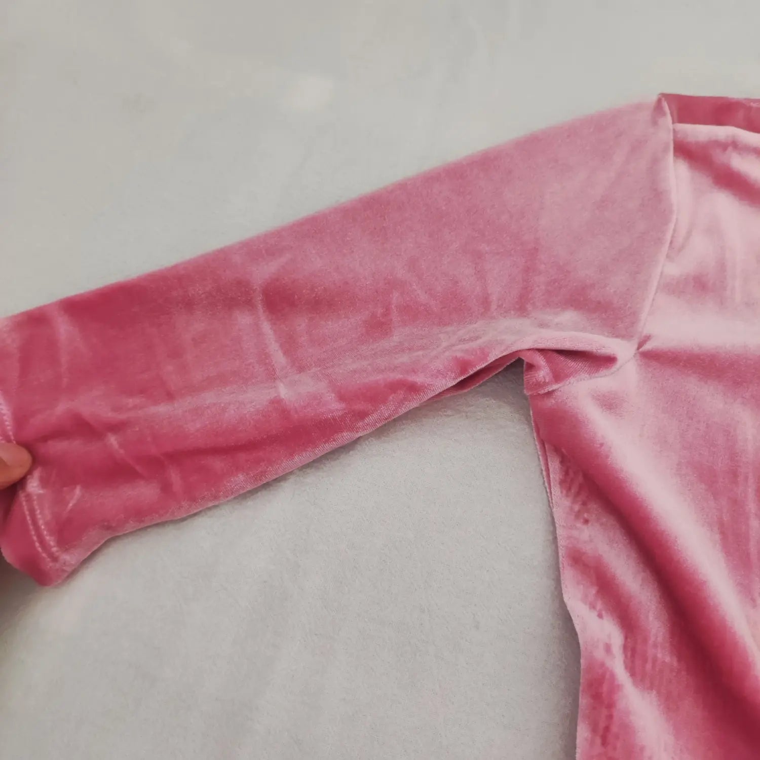 sleeve-detail-view | Close up of three-quarter length sleeve, soft pink velvet fabric stitching for women swing dress